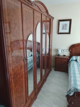 Dormitorio madera clásico
