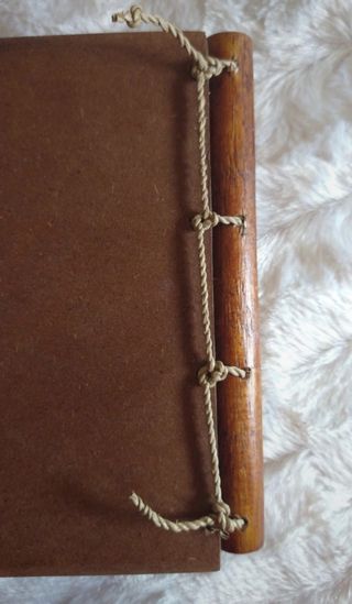 Álbum fotos madera grabada