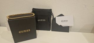 Pulsera Guess dorada con cristales negros