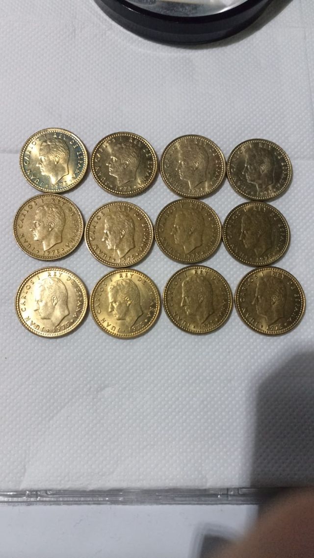 1 Peseta 1978 Chile, 1 Grã-Bretanha, 1 Espanha