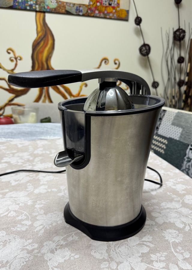 Exprimidor c/brazo - acero inoxidable