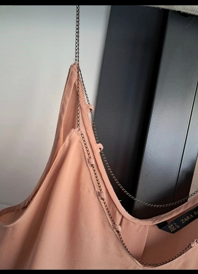 Blusa rosa palo cadenita escote