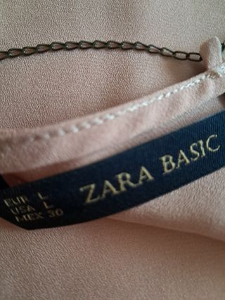 Blusa rosa palo cadenita escote