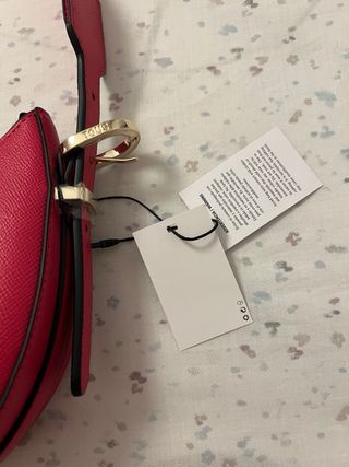 Bolso Tous fucsia bandolera