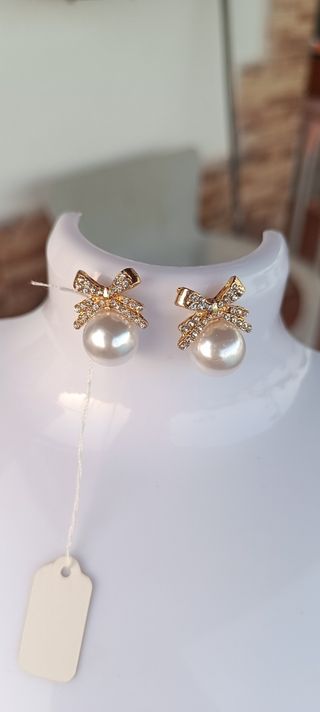 Pendientes perla lazo dorados