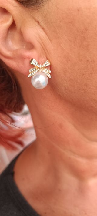Pendientes perla lazo dorados
