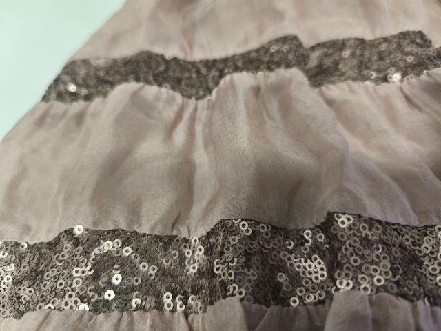 Vestido/cancán rosa palo con lentejuelas.