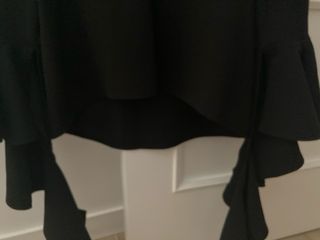 Blusa negra de volantes