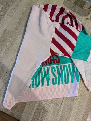 Jersey navideño rayas rojas
NUEVO sin estrenar
