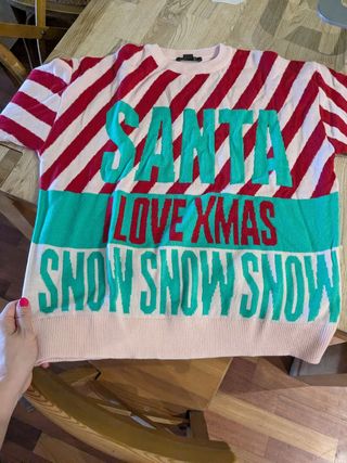 Jersey navideño rayas rojas
NUEVO sin estrenar
