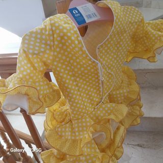 Vestido niña de SEVILLANA comprado en El ROCÍO. 