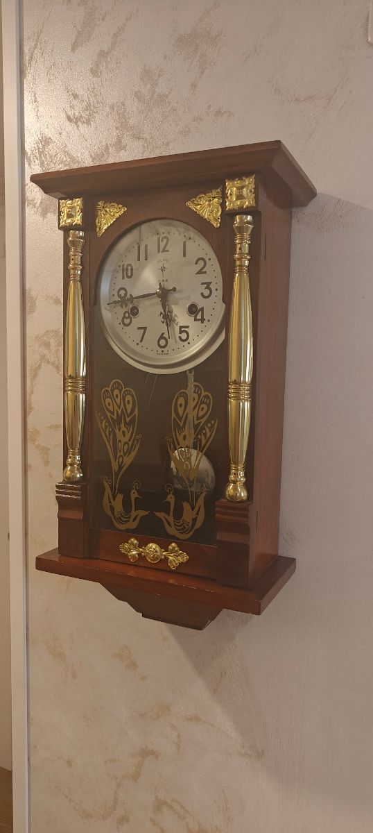 Reloj péndulo Polaris antiguo