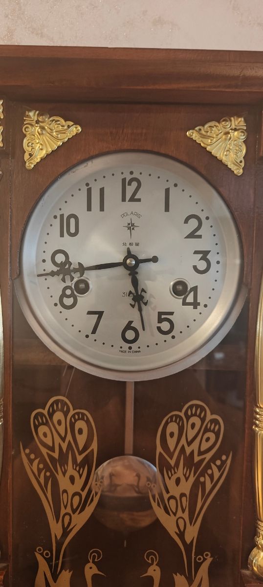 Reloj péndulo Polaris antiguo