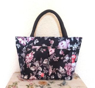 Bolso de mano.