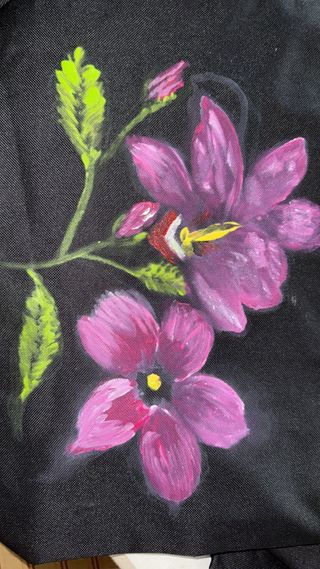 Bolsa artesanal de tela, decorada a manocon flores
