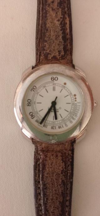 Reloj Benetton marrón y plata