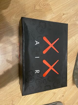 Jordan 4 Retro x KAWS