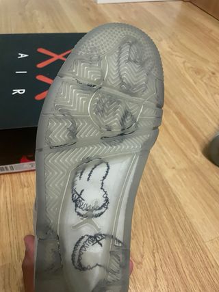 Jordan 4 Retro x KAWS