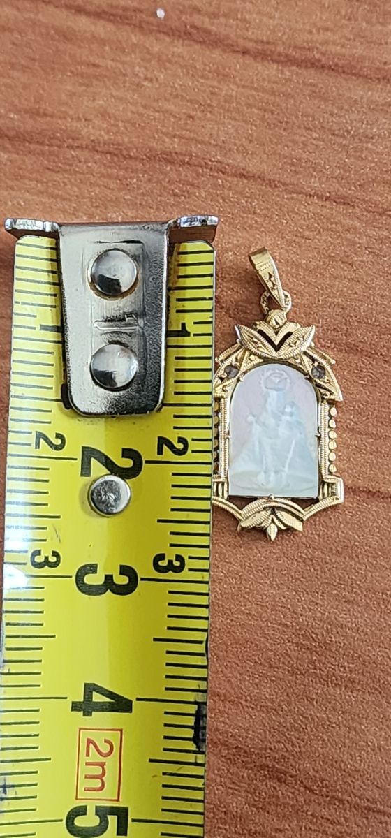 Medalla oro y nácar