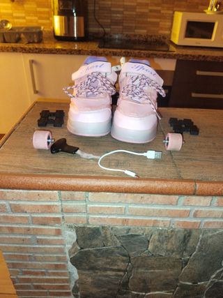 Zapatillas deportivas con ruedas rosa talla 34