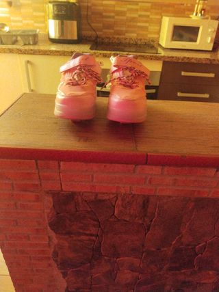 Zapatillas deportivas con ruedas rosa talla 34