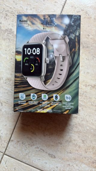Smartwatch rosa marca sami con cargador incluido