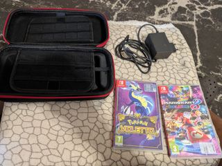 Nintendo Switch OLED bianca e nera + giochi