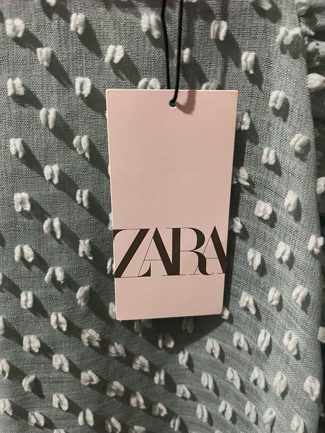 Blusa verde agua perforada