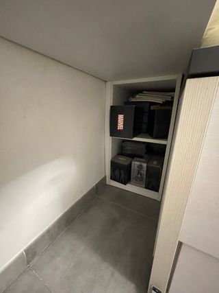 Cama juvenil con cajones y una mesa