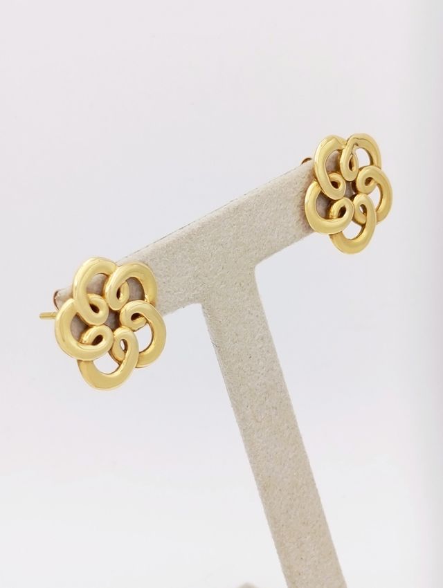 Pendientes TOUS en oro de 18K,  flor calada.