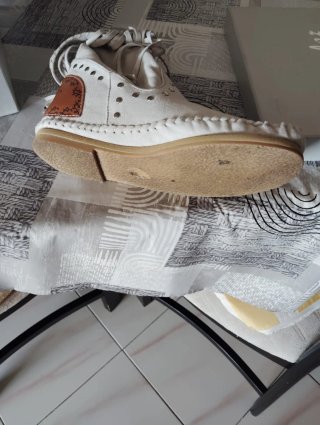 Botines beige con flecos