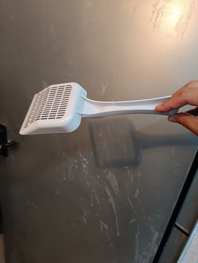 Pala para arena de gato