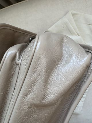 Bolso Yves Saint Laurent Beige
modelo Niky