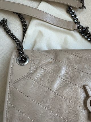 Bolso Yves Saint Laurent Beige
modelo Niky