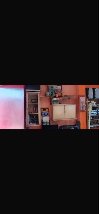 URGE. Sofá rinconero azul y naranja