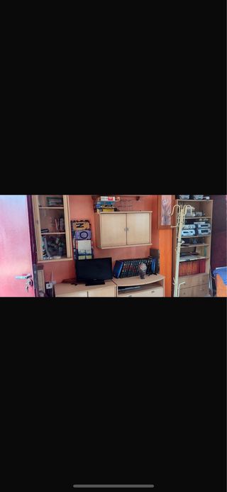 URGE. Sofá rinconero azul y naranja