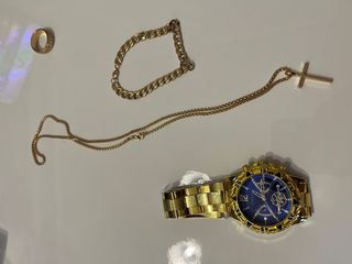 Orologio, collana, anello e bracciale...no oro