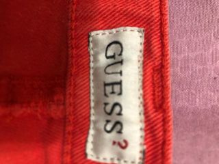 Pantaloni a zampa Guess rossi