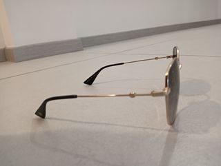 Occhiali Gucci oro-grigi