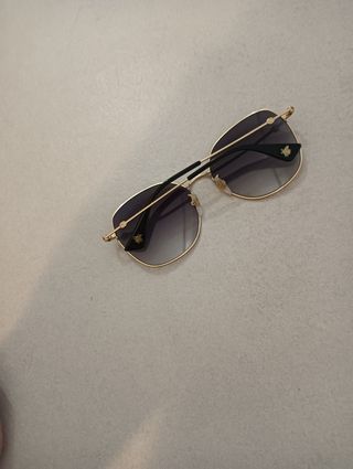 Occhiali Gucci oro-grigi