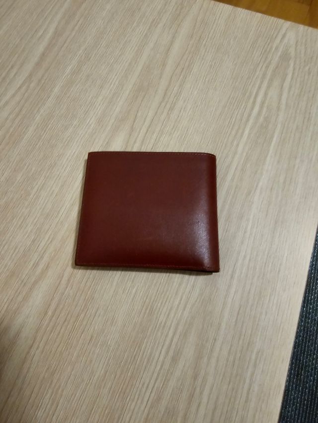 Cartera Hermes rojo muy oscuro