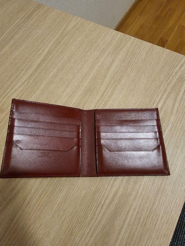 Cartera Hermes rojo muy oscuro