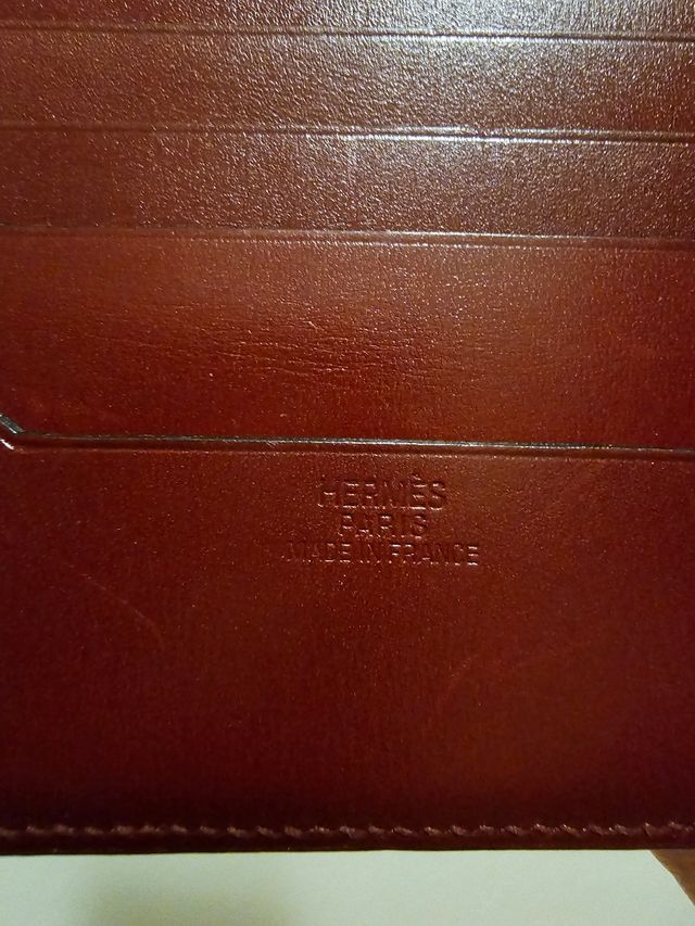 Cartera Hermes rojo muy oscuro
