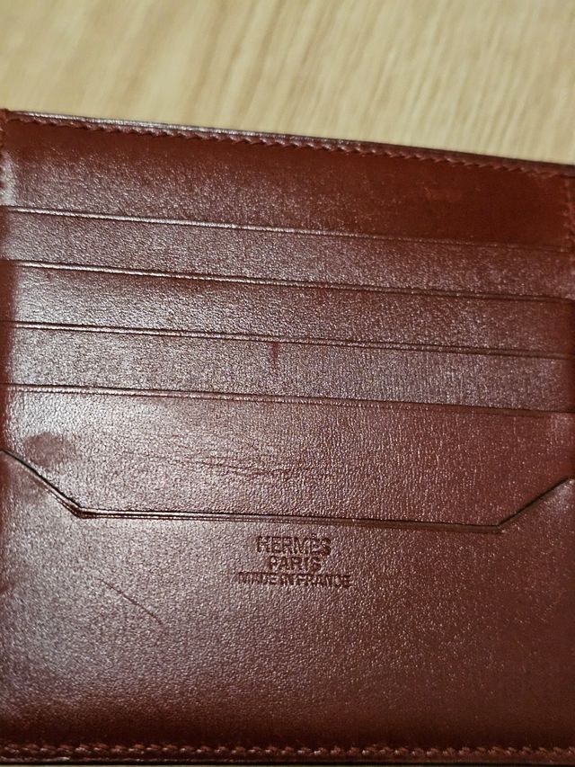 Cartera Hermes rojo muy oscuro