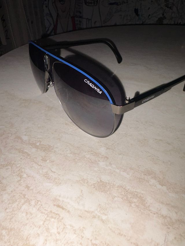 Gafas CRADNRA Negras con filo Azul.