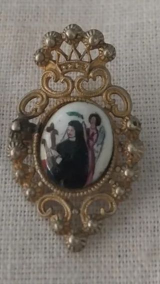 Broche antiguo Santa Rita