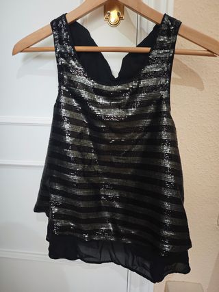 Blusa lentejuelas negra plata