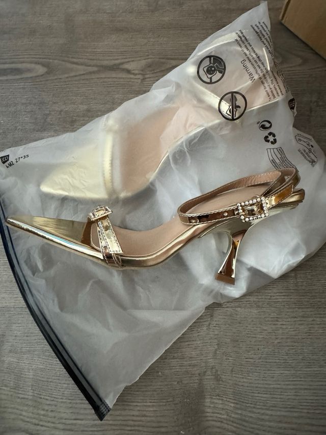 Sandalias doradas tacón 37