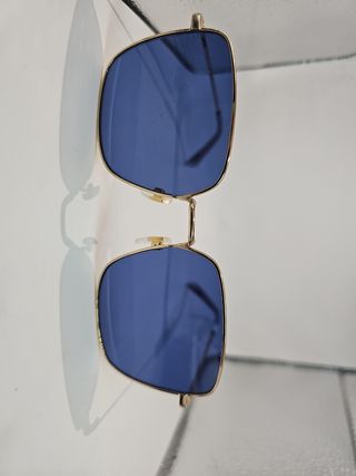Gafas Levis azules y doradas