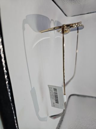 Gafas Levis azules y doradas